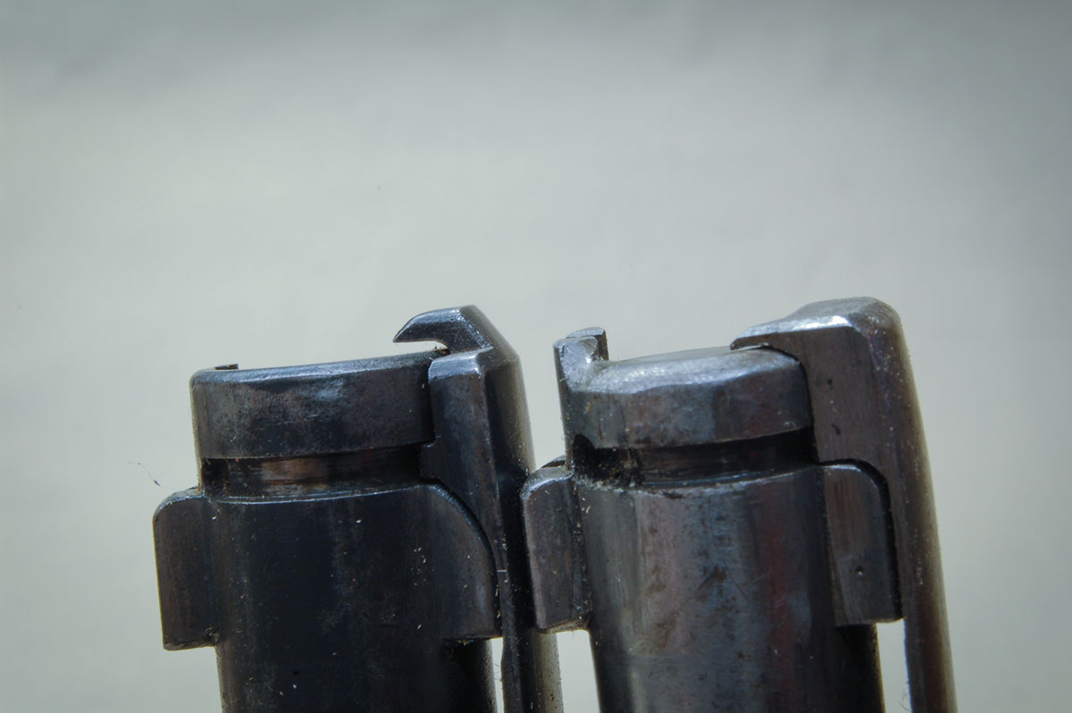 An extractor on a Siamese bolt head (left) must protrude past flush to engage a rimmed cartridge and requires a relief cut in the barrel face. The bolt face for the rimless case (right) does not require this.
